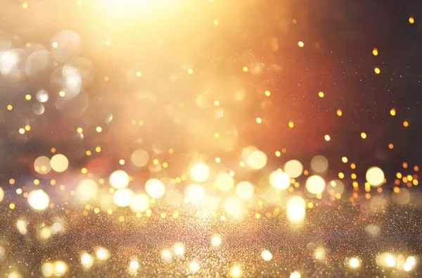Glitter Φώτα Εκλεκτής Ποιότητας Φόντο Μαύρο Και Χρυσό Επικεντρώθηκε — Φωτογραφία Αρχείου