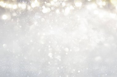Glitter vintage ışıklar arka plan. de-odaklı gümüş ve ışık altın