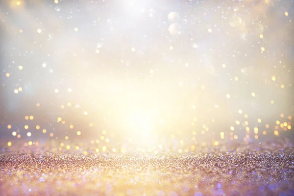 Glitter vintage lights background. silver and gold. de-focused. — Stock Photo, Image
