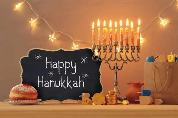 image of jewish holiday Hanukkah background with menorah (traditional candelabra)