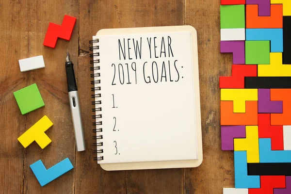 Top View 2019 Goals List Notebook Wooden Desk — Stock Photo, Image