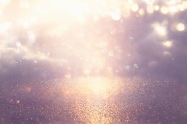 Glitter vintage ışıklar arka plan. Gümüş ve altın. de-odaklı