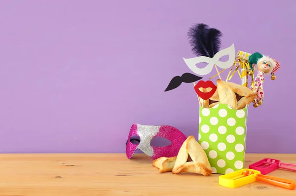 Purim Celebration Concept Jewish Carnival Holiday Wooden Table Purple Background — Stock Photo, Image