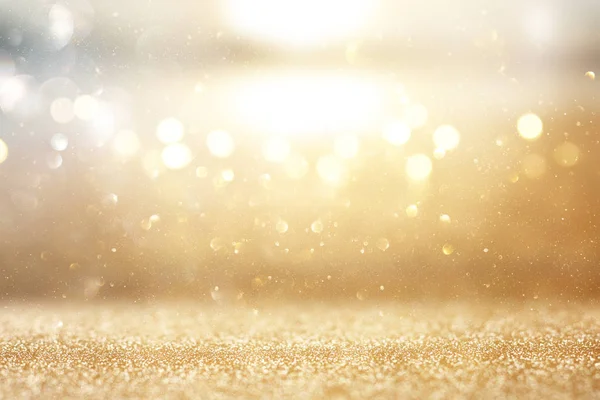 Photo of gold and silver glitter lights background — Stock Photo, Image