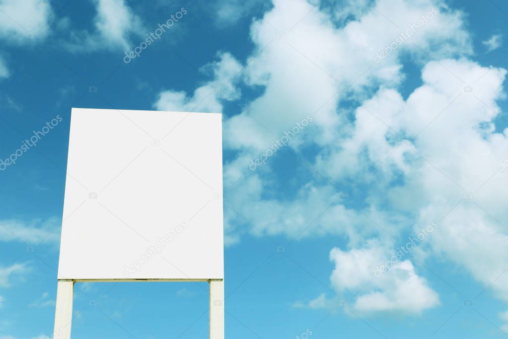 blank sign against blue crisp sky