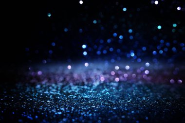 glitter vintage ışıklar arka plan. siyah gümüş ve mavi. de-odaklı