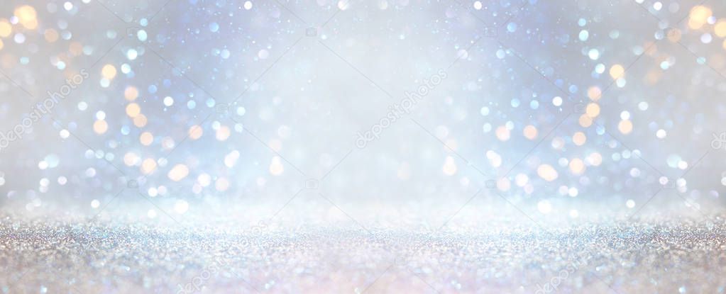 glitter silver and gild lights background. de-focused