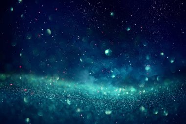 glitter vintage ışıklar arka plan. siyah, mavi, yeşil ve gümüş. de-odaklı