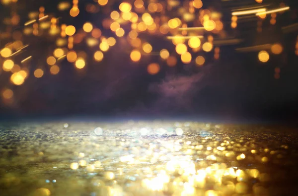 Glitter φώτα εκλεκτής ποιότητας φόντο. μαύρο και χρυσό. de-επικεντρώθηκε — Φωτογραφία Αρχείου