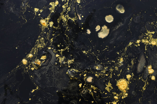 Abstract marbleized effect background. black and gold creative colors