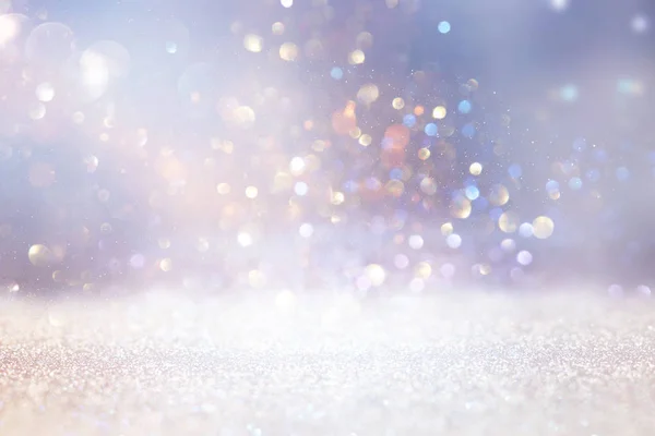 Abstract glitter silver and gold lights background. de-focused — Stock Photo, Image