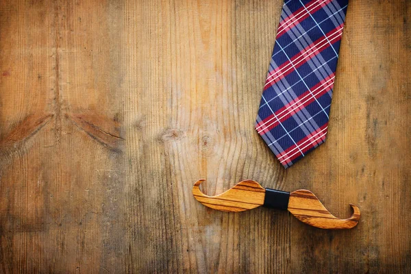 Father's day concept. Necktie and mustache over wooden background. top view, flat lay — Stock Photo, Image