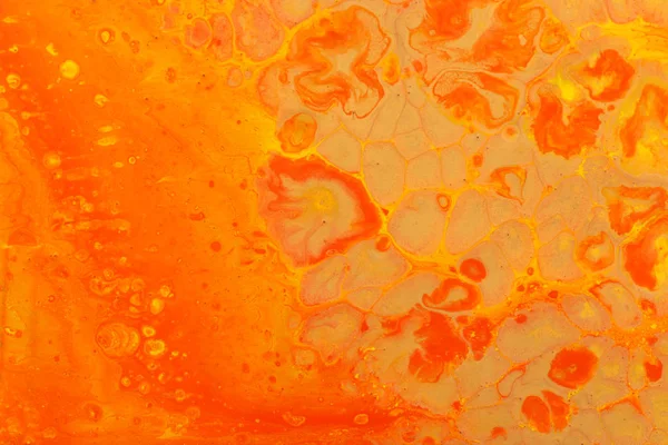 Fotografování abstraktního, marbleizovaného efektu. červené a oranžové tvůrčí barvy — Stock fotografie