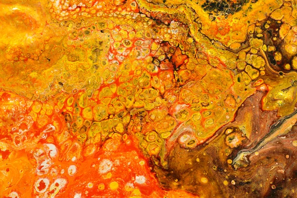 Fotografování abstraktního, marbleizovaného efektu. červené a oranžové tvůrčí barvy — Stock fotografie
