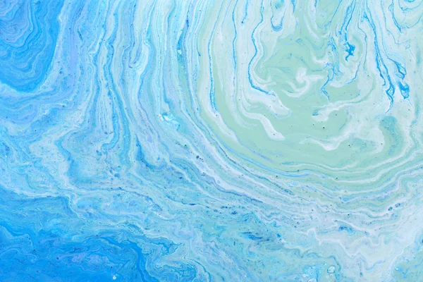 抽象的な大理石の効果の背景の写真。青と白の創造的な色。美しい塗料. — ストック写真