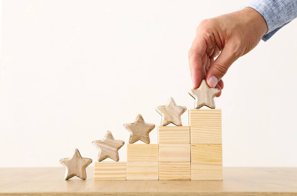business concept image of setting a five star goal. increase rating or ranking, evaluation and classification idea