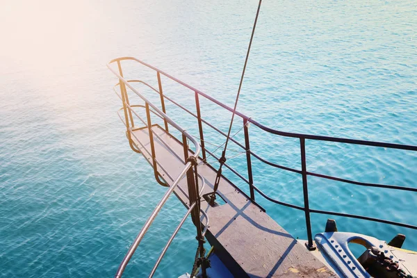 transportation image of ship's bow, moving through the sea