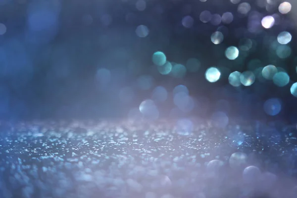 Blackground of abstract glitter lights. blue, gold and black. de focused — Stock Photo, Image