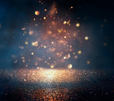 soyut glitter ışıkları niçin kara zemin. mavi, altın ve siyah. de odaklı