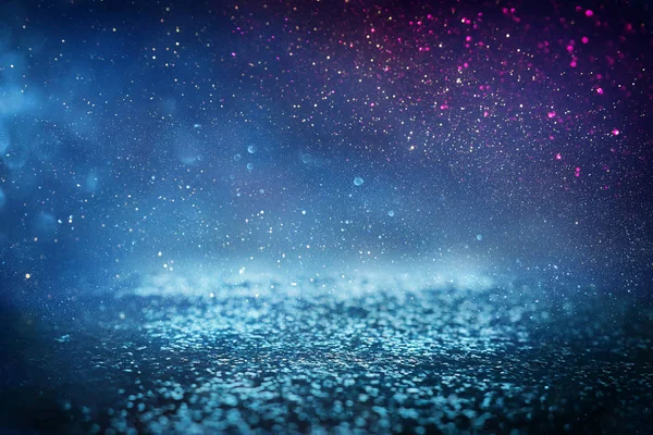 Terra nera di luci glitter astratte. blu, argento e nero. de focalizzata — Foto Stock