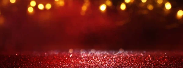 Abstract Red glitter lights background. defocused — Stock Photo, Image