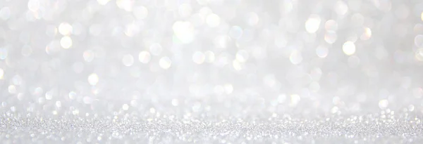 Sfondo di luci glitter astratte. argento e bianco. de-focu — Foto Stock