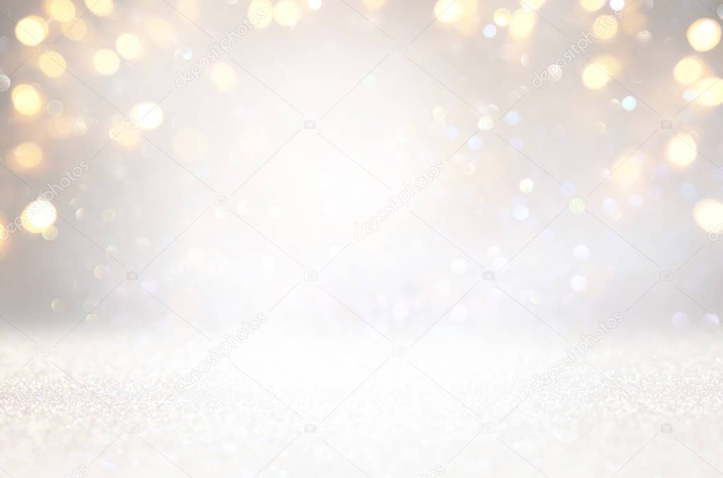 blackground of abstract glitter lights. silver and gold. de-focused
