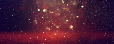 soyut Kırmızı glitter ışıkları arka plan . deffocused. Afiş