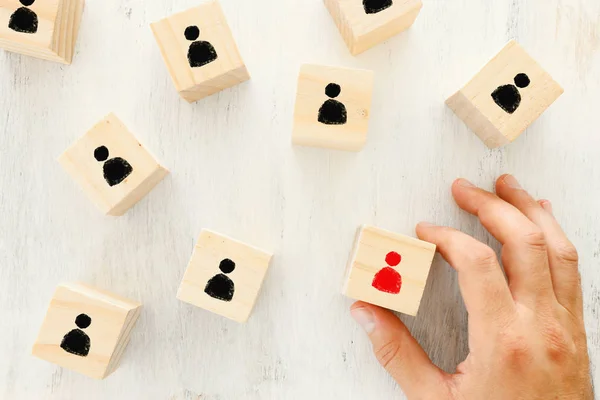 Business concept image of wooden cubes with people icons over the table, human resources and management concept — Stock Photo, Image