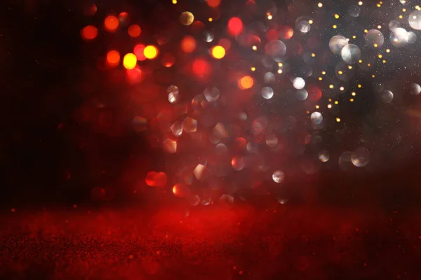 Fond de lumières abstraites paillettes rouges. déconcentré — Photo