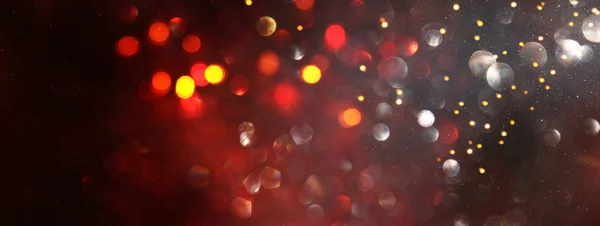 Hintergrund abstrakter roter Glitzerlichter. Defokussiert. Banner — Stockfoto