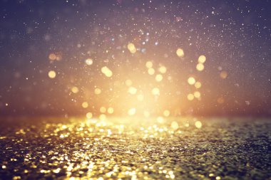 soyut glitter ışıkları arka plan. altın ve siyah. de odaklı