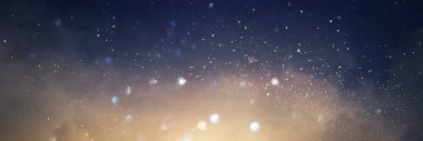 soyut glitter ışıkları arka plan. mavi, altın ve siyah. de odaklanmış. Afiş