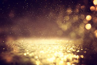 soyut glitter ışıkları arka plan. altın ve siyah. de odaklı