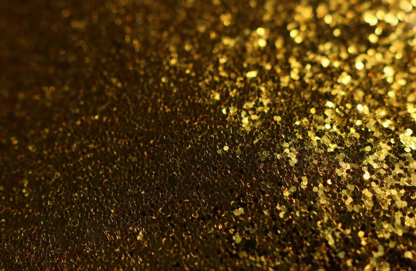 Sfondo di luci glitter astratte. oro e nero. de focalizzata — Foto Stock