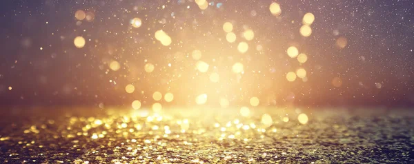 soyut glitter ışıkları arka plan. altın ve siyah. de odaklanmış. Afiş