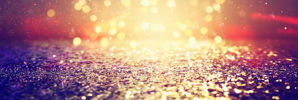 Hintergrund abstrakter Glitzerlichter. blau, gold und schwarz. Defokussiert. Banner — Stockfoto