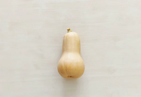 holidays Halloween image. pumpkin over wooden white table. top view, flat lay