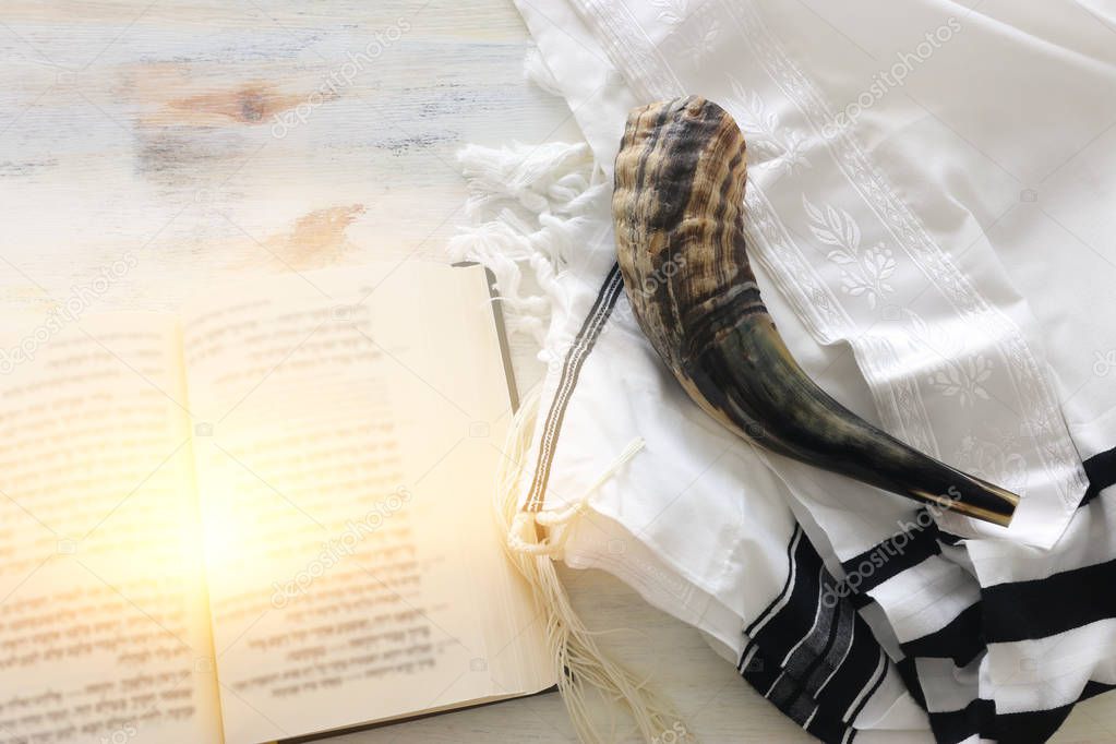 religion image of Prayer Shawl - Tallit, Prayer book and Shofar (horn) jewish religious symbols. Rosh hashanah (jewish New Year holiday), Shabbat and Yom kippur concept.