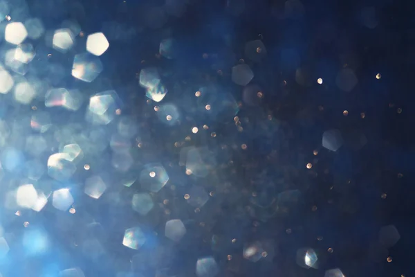 Background of abstract glitter lights. blue, gold and black. de focused — Stock Photo, Image