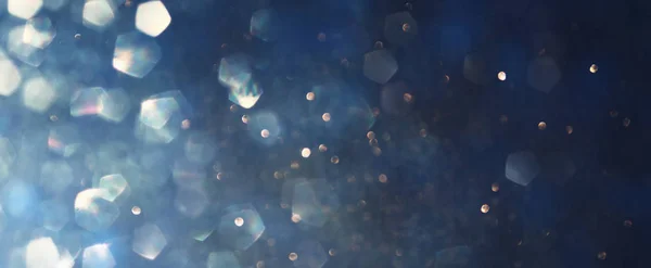 Background of abstract glitter lights. blue, gold and black. de focused. banner — Stock Photo, Image