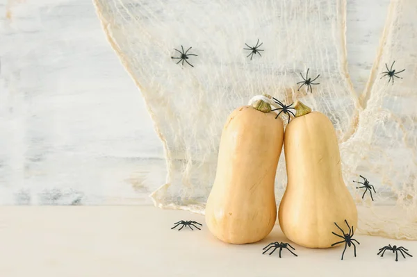 holidays Halloween image. pumpkin over wooden white table