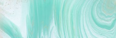 photography of abstract marbleized effect background. turquoise, gold, blue and white creative colors. Beautiful paint. banner clipart
