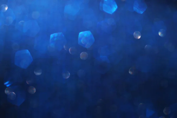 Sfondo di luci glitter astratte. blu e nero. de focalizzata — Foto Stock