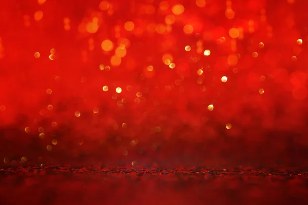 Фон абстрактних червоних блискучих вогнів. дефокусований — стокове фото