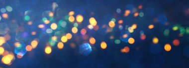 soyut glitter gümüş, altın, mavi ışıklar arka plan. de-odaklı. Afiş