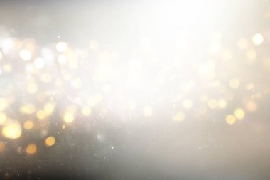 glitter vintage ışıkları soyut backgrounf . gümüş, altın ve beyaz. de-odaklı