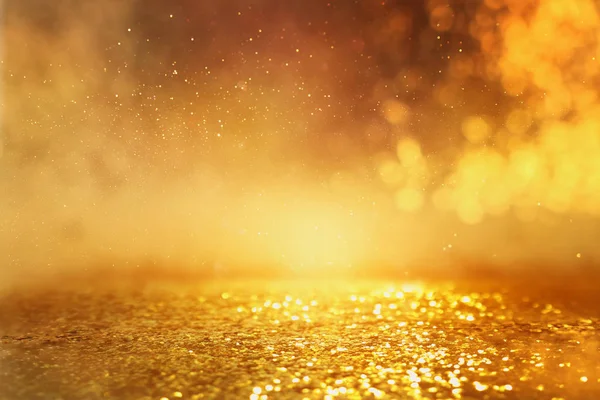 Background of gold glitter lights. de focused — Stock Photo, Image