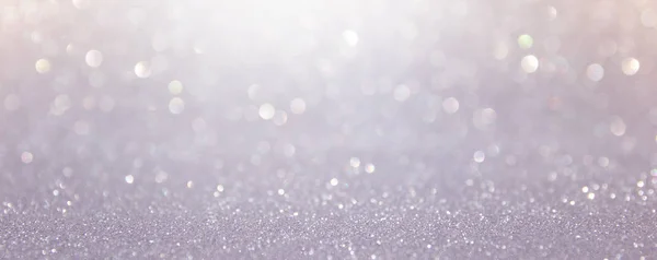 Abstract backgrounf of glitter vintage lights . silver and white. de-focused. banner — Stock Photo, Image