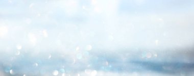 soyut glitter gümüş, altın, mavi ışıklar arka plan. de-odaklı. Afiş